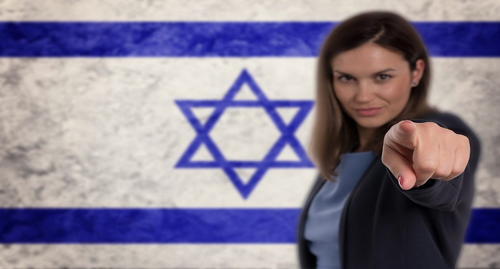 Beautiful,Businesswoman,Pointing,Her,Finger,At,You,Israel,Flag,Background.