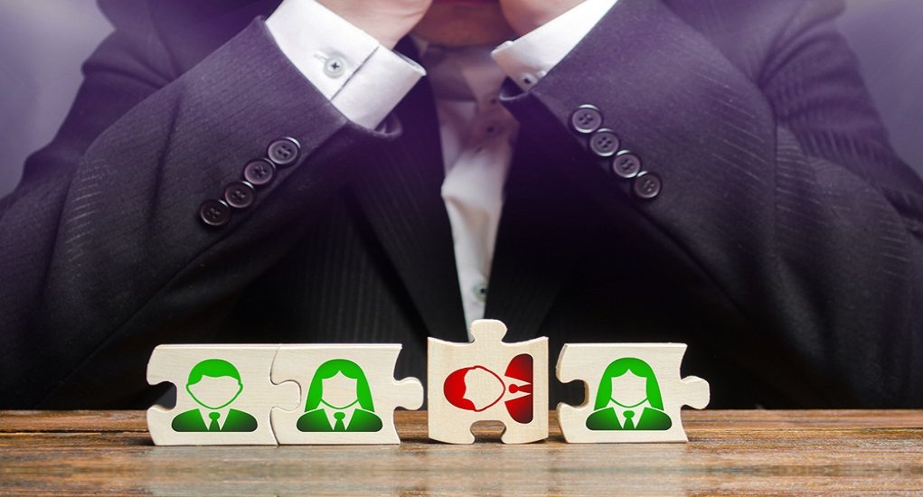 Businessman,Sitting,In,Despair,Over,The,Not,Assembled,Puzzles,Symbolizing