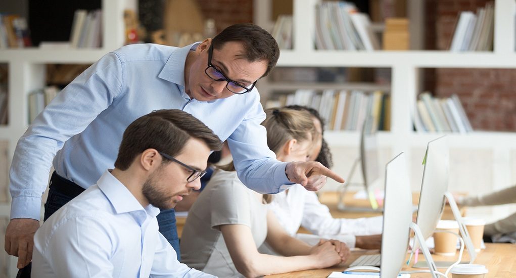 Angry,Boss,Criticizing,Scolding,Sad,Male,Employee,For,Computer,Mistake