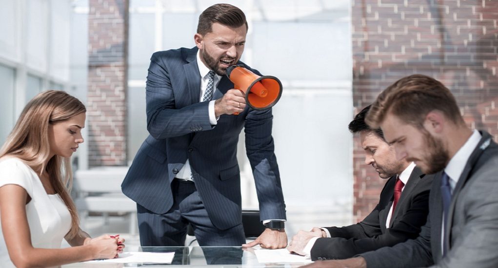 Businessman,Uses,A,Megaphone,To,Talk,To,A,Business,Team