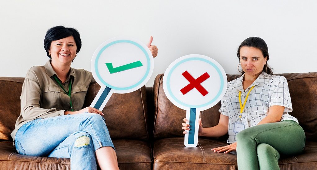 Women,Sitting,On,Couch,Holding,Tick,Icons