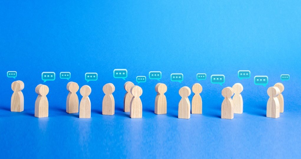 Many,People,Figures,And,Comment,Clouds,Above.,Process,Of,Discussion