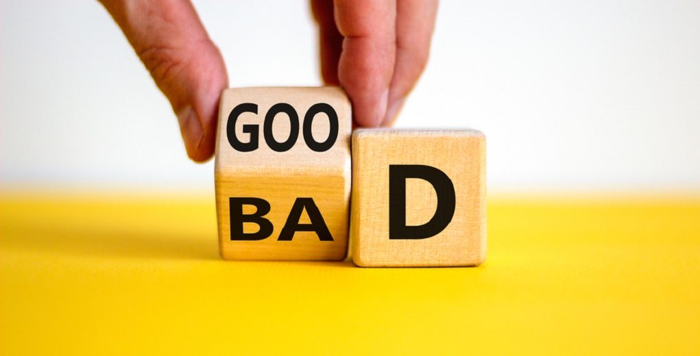 Good,Or,Bad,Symbol.,Businessman,Hand,Turns,A,Cube,And
