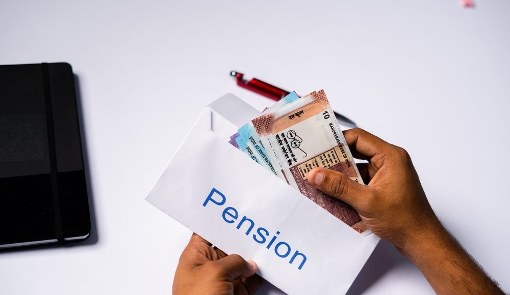 Shoulder,Shot,Of,Man,Opening,Received,Pension,Money,From,Envelope