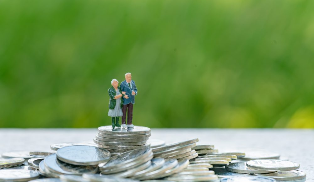 Concept,Of,Retirement,Planning.,Miniature,People:,Old,Couple,Figure,Standing