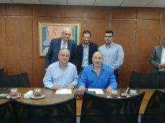 חישוב ערך השעה עם קיצור שבוע העבודה תמונה ממעמד החתימה על ההסכם. באדיבות דוברות ההסתדרות